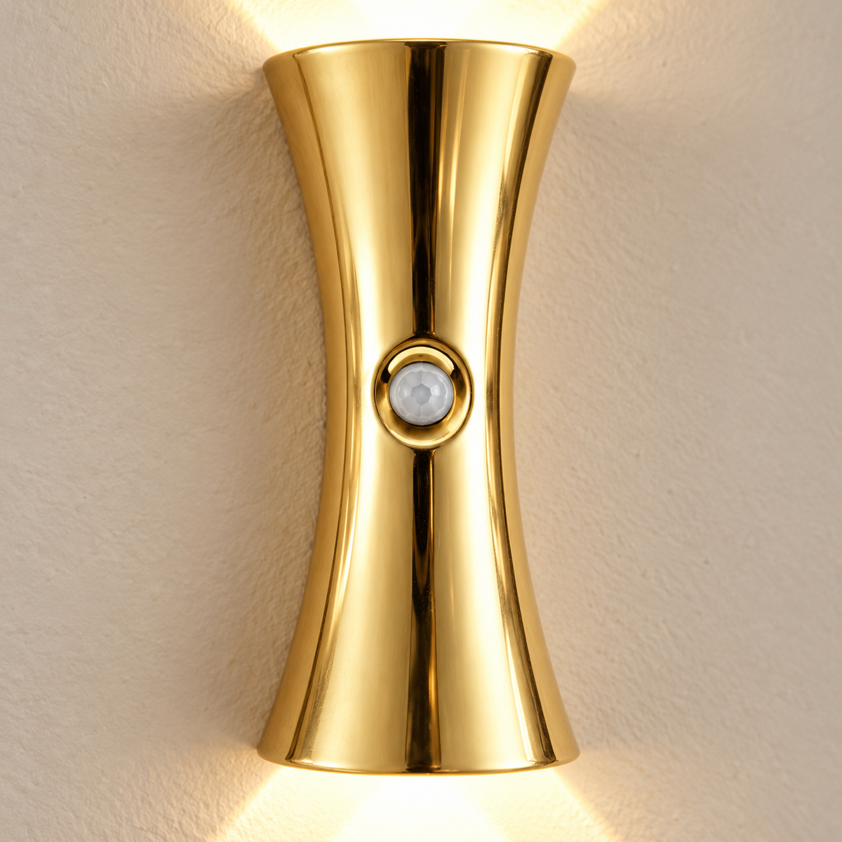 Close-up of the gold hourglass body and faceted central motion sensor