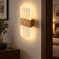 Wood-effect cordless sensor light mounted beside a dark bedroom doorway